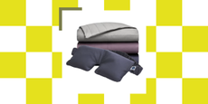 Sleep Number weighted eye mask and blankets pictured againsta a colorful checkered bacgkround