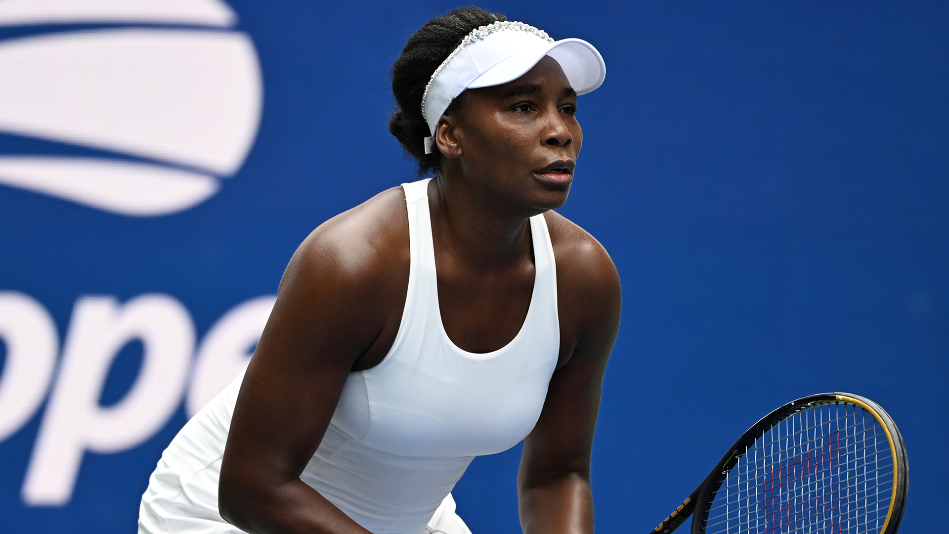 Venus Williams competed in the doubles match at the 2025 US Open in a white tennis dress from H&amp;M