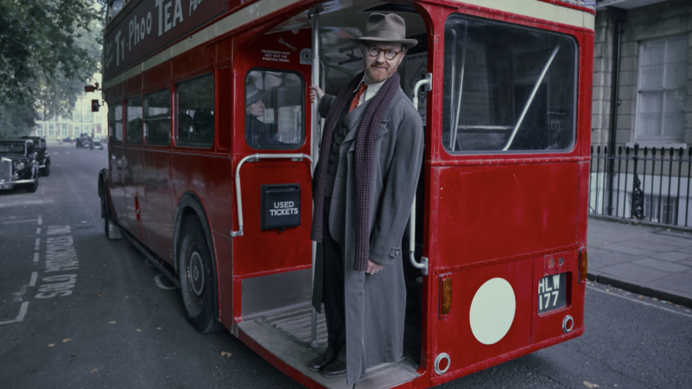 Gabriel Book (Mark Gatiss) riding an old-fashioned London bus in Bookish season 1