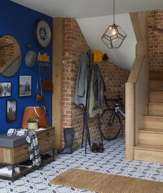 Blue hallway with natural jute rug