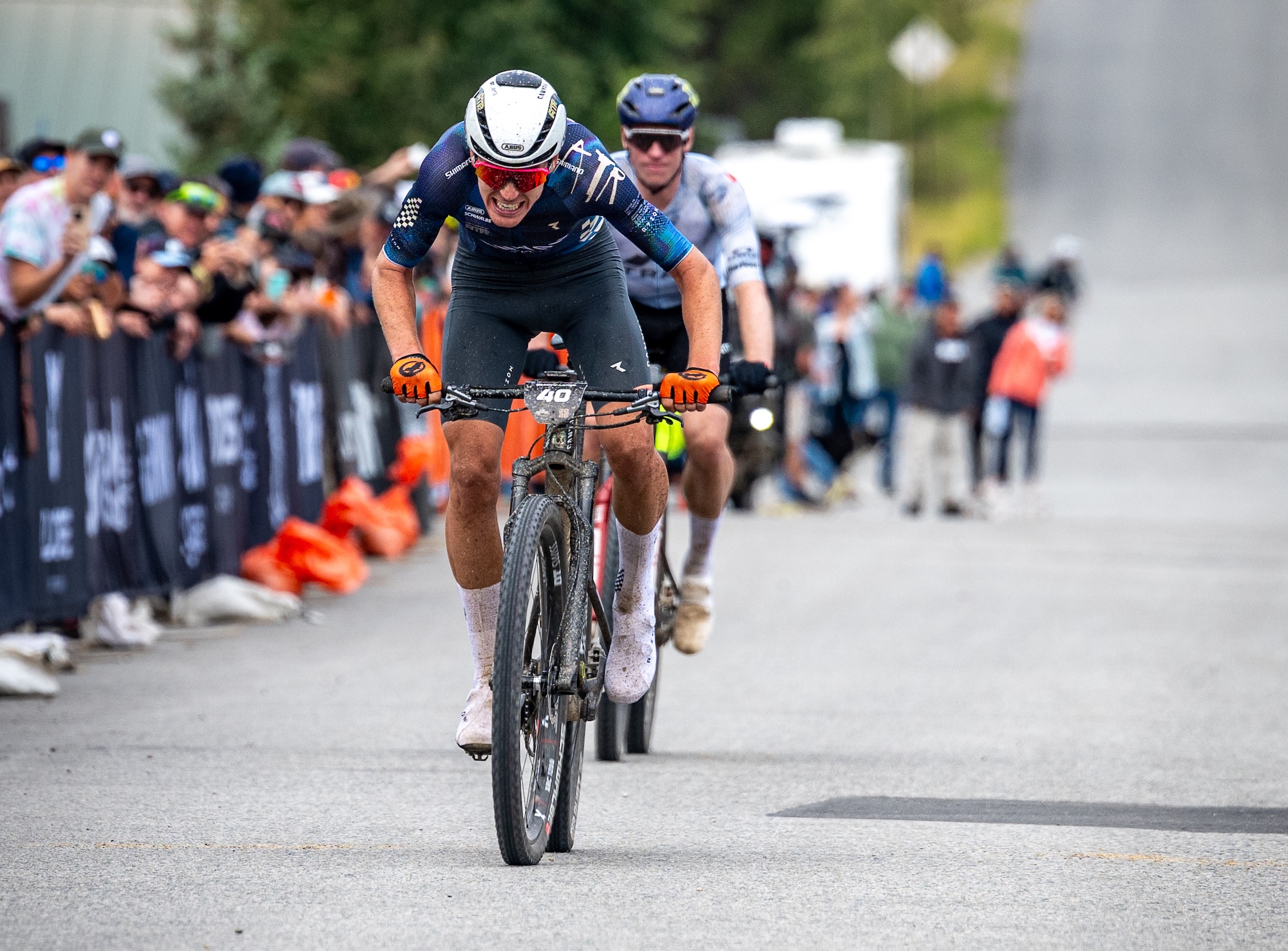 Bradyn Lange outsprints John Gaston for third place