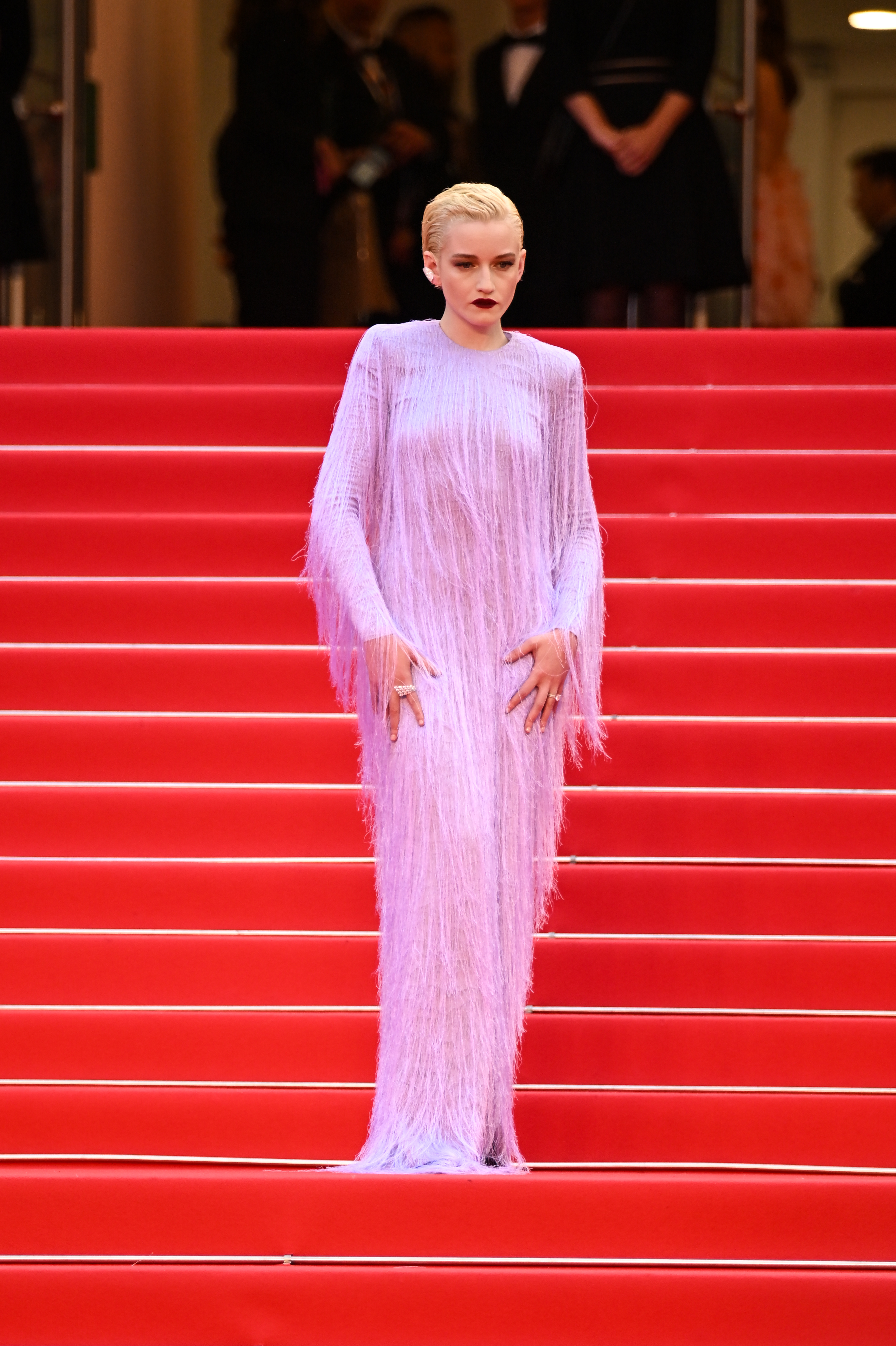 Julia Garner wears a purple dress on the 2025 Cannes Film Festival red carpet.