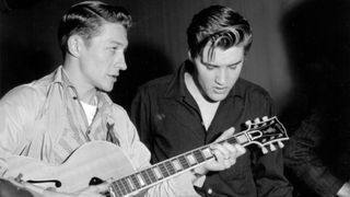 Scotty Moore and Elvis Presley