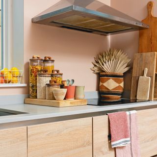 Pink kitchen with glass cannisters