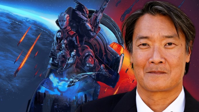 Doug Jung in front of Mass Effect graphic