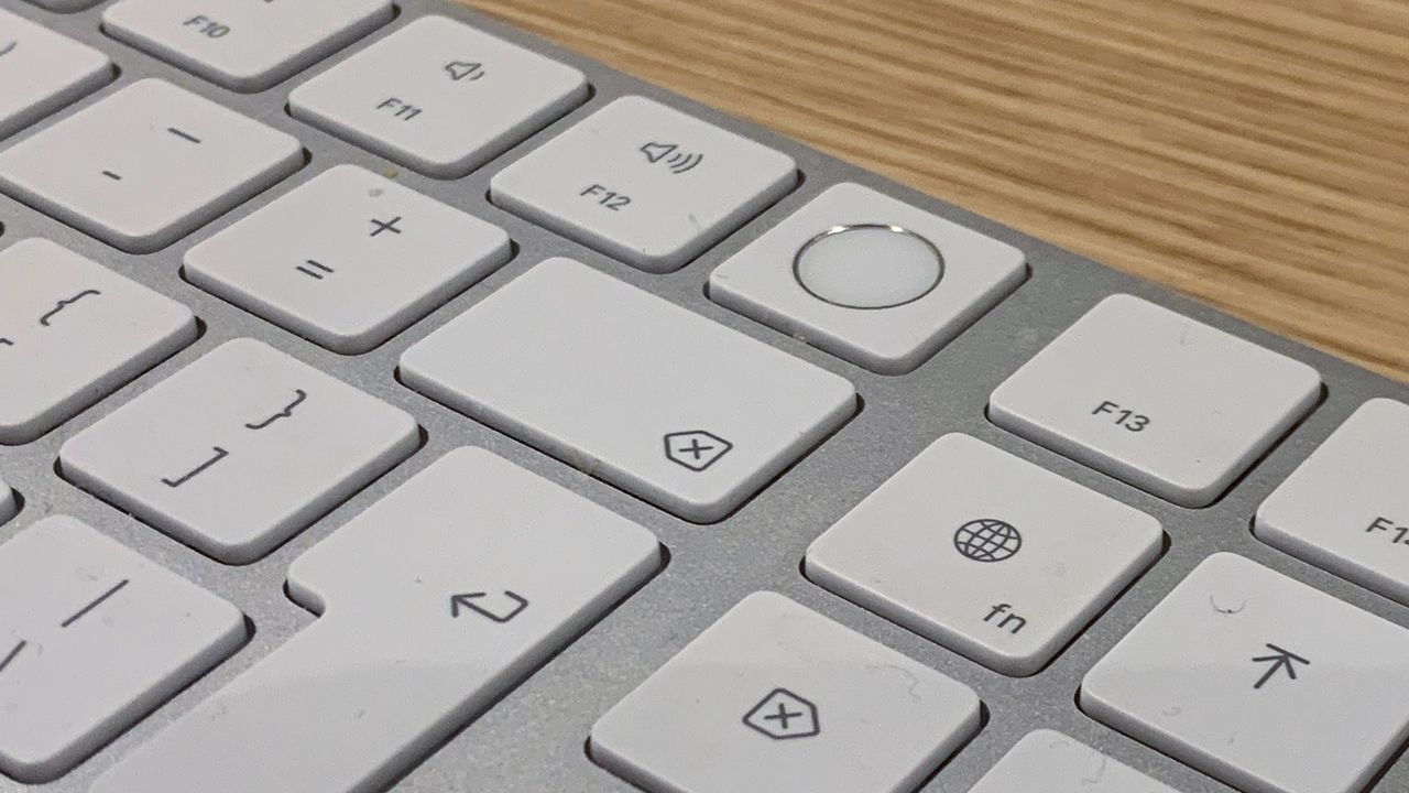 A closeup of the Touch ID sensor on the 2021 24in Apple iMac's Magic Keyboard