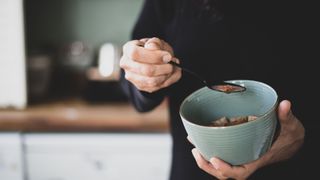 Person eating cereal