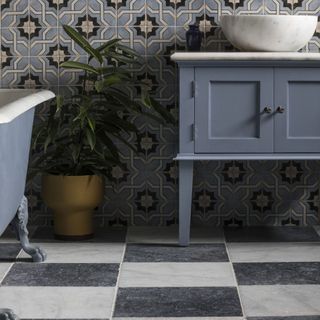 bathroom with marble flooring and potted plant