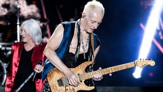 Phil Collen plays live onstage with his signature Jackson Soloist