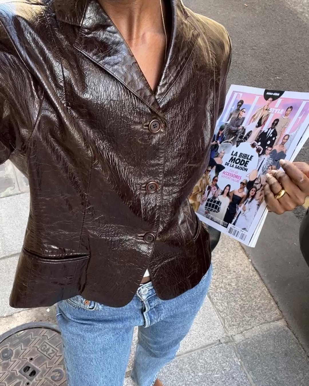 woman wearing winter to spring transitional jacket trends 2026