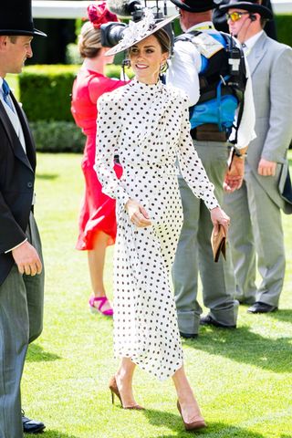 Kate Middleton wears a polka dot dress and brown heels attends Royal Ascot at Ascot Racecourse on June 17, 2022 in Ascot, England.