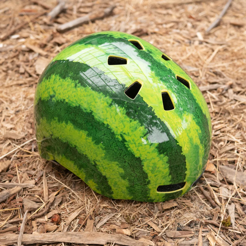 Nutcase Helmets Little Nutty kid's helmet on the ground 