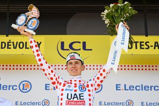 SUPERDEVOLUY LE DEVOLUY FRANCE JULY 17 Tadej Pogacar of Slovenia and UAE Team Emirates celebrates at podium as Polka Dot Mountain Jersey winner during the 111th Tour de France 2024 Stage 17 a 1778km stage from SaintPaulTroisChateaux to Superdevoluy 1500m UCIWT on July 17 2024 in Superdevoluy Le Devoluy France Photo by Dario BelingheriGetty Images