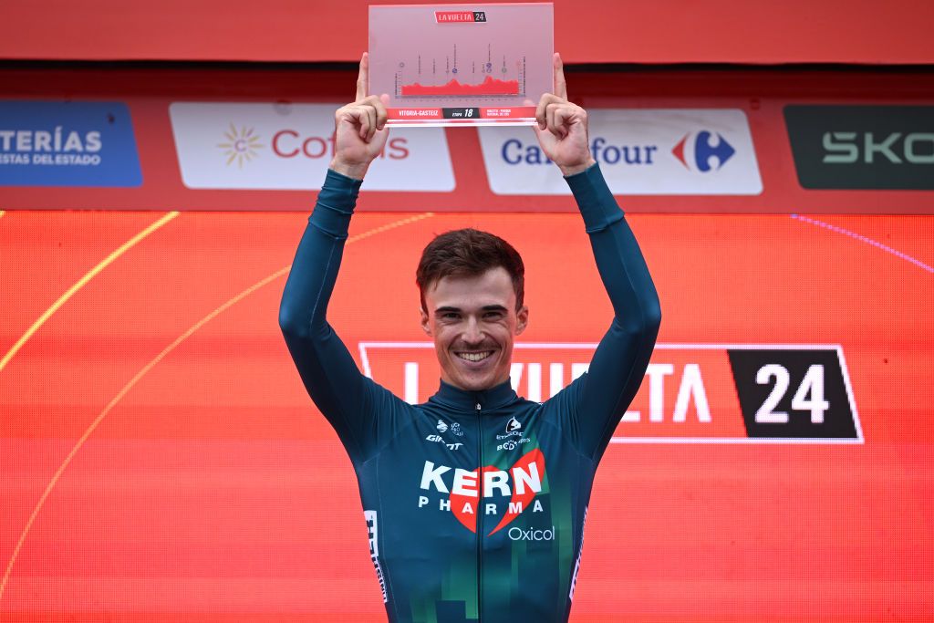 MAESTU PARQUE NATURAL DE IZKI SPAIN SEPTEMBER 05 Urko Berrade of Spain and Team Equipo Kern Pharma celebrates at podium as stage winner during the La Vuelta 79th Tour of Spain 2024 Stage 18 a 1798km stage from VitoriaGasteiz to Maestu Parque Natural de Izki UCIWT on September 05 2024 in Maestu Parque Natural de Izki Spain Photo by Dario BelingheriGetty Images