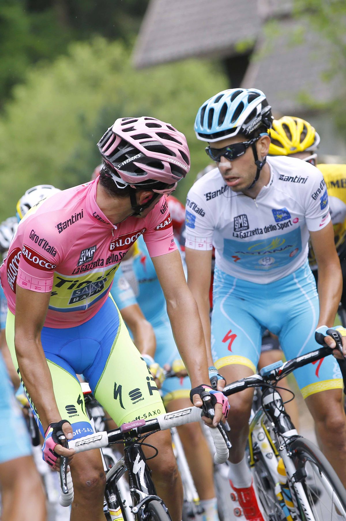Alberto Contador checks on Fabio Aru (Astana)
