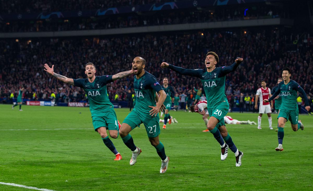 Lucas Moura of Tottenham Hotspur celebrates, with teammates Toby Alderweireld and Dele Alli, after scoring the winning goal against Ajax in the second leg of the 2018/19 UEFA Champions League semi-final at the Johan Cruijff ArenA in Amsterdam, May 2019