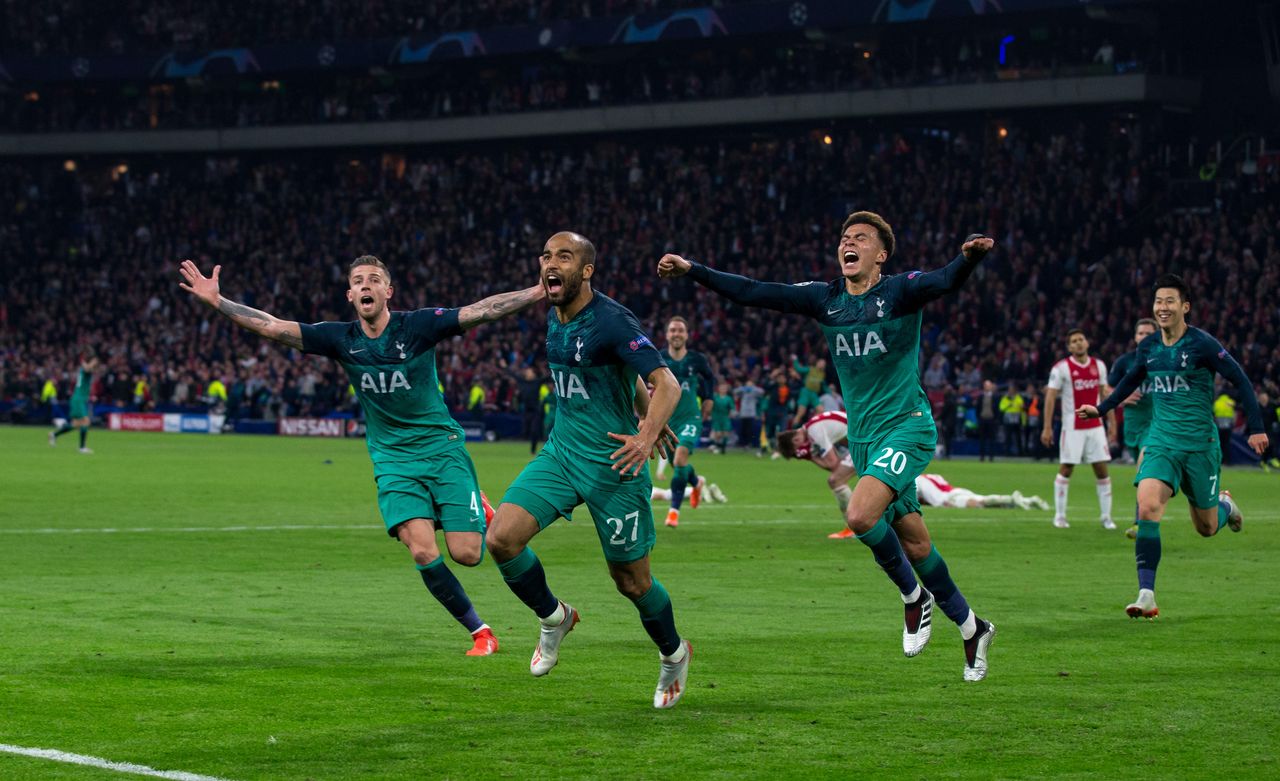 Lucas Moura of Tottenham Hotspur celebrates, with teammates Toby Alderweireld and Dele Alli, after scoring the winning goal against Ajax in the second leg of the 2018/19 UEFA Champions League semi-final at the Johan Cruijff ArenA in Amsterdam, May 2019