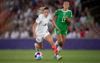 Ella Toone of England and Laura Rafferty of Northern Ireland in action during the UEFA Women's Euro England 2022 group A match between Northern Ireland and England at St Mary's Stadium on July 15, 2022 in Southampton, United Kingdom.