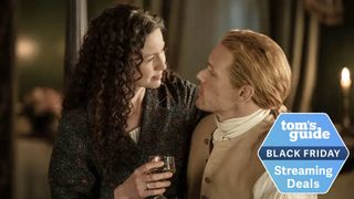 Claire (Caitríona Balfe) and Jamie (Sam Heughan) embrace each other in Outlander season 7 part 2