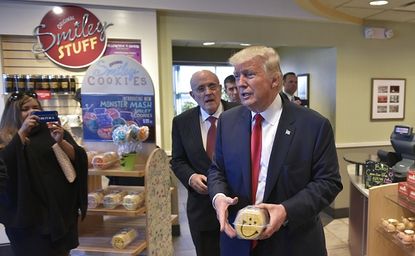 Trump picks up cookies on the campaign trail at the Eat'n Park restaurant.