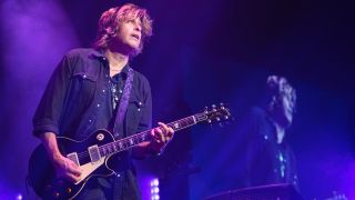 Dean DeLeo of Stone Temple Pilots performs live