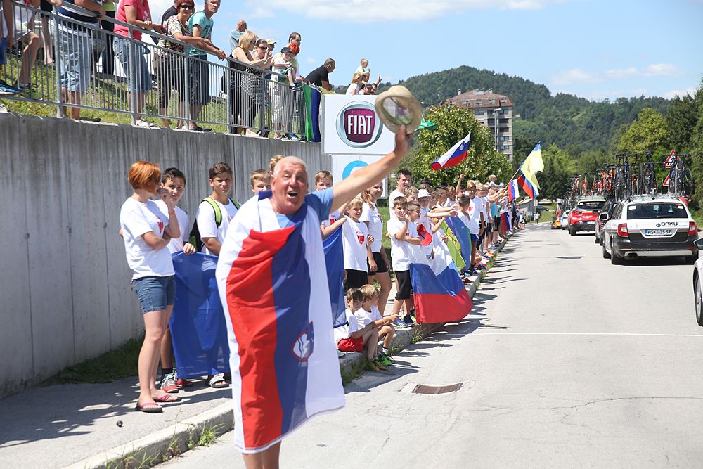 Slovenian fans line the road for the final stage