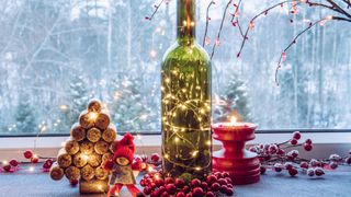 A old wine bottle filled with fairy lights