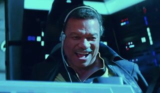 Star Wars: The Rise of Skywalker Lando laughing at the controls of the Millennium Falcon