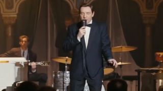 Kevin Spacey in a tuxedo, singing on stage in Beyond The Sea