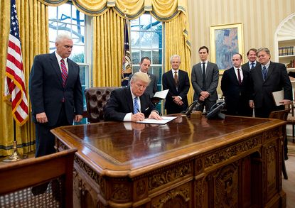 President Trump signs executive order. 