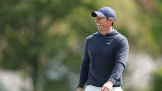 Rory McIlroy smiling during a practice round ahead of the 2023 PGA Championship