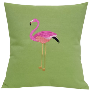Light green cushion with a pretty pink flamingo print in the middle.