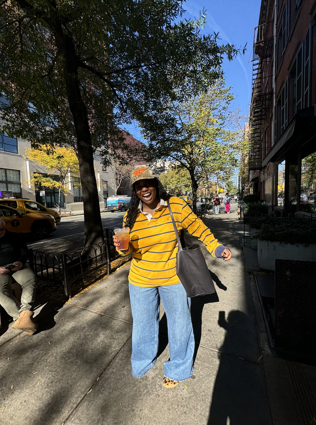Tariro Makoni wearing a yellow rugby shirt