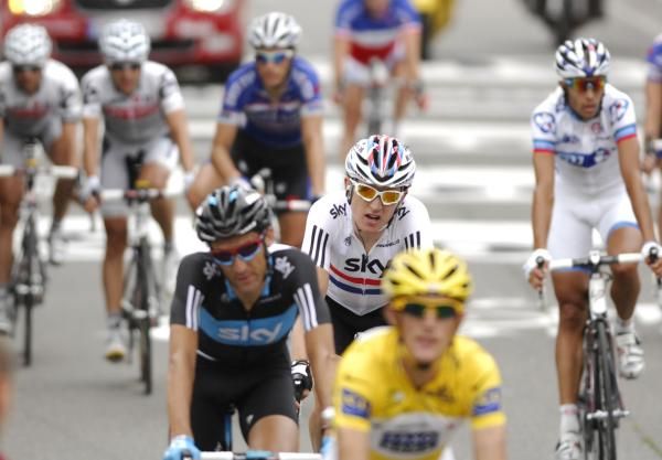 Geraint Thomas (Sky) in the colours of British champion comes across the line in the company of yellow jersey Andy Schleck in Revel