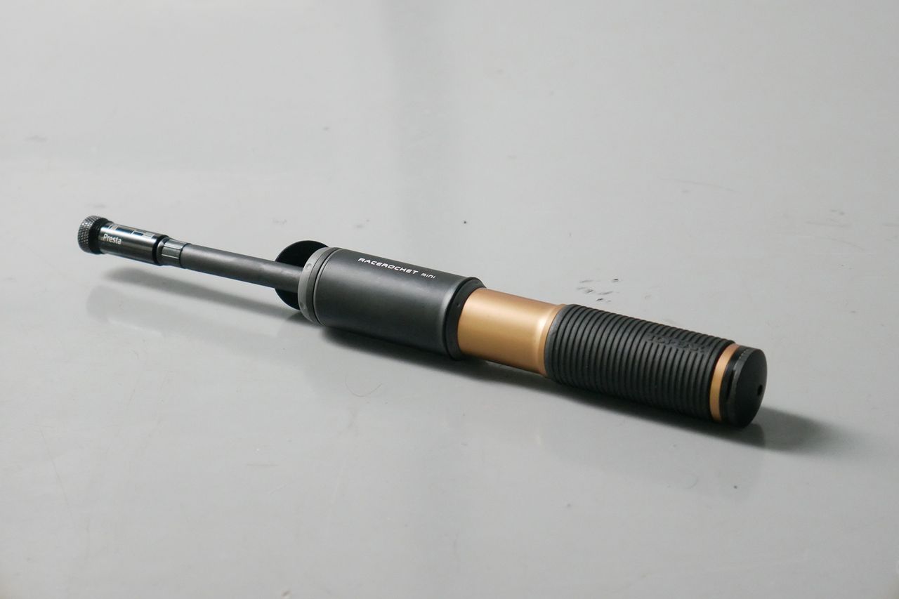 Best bike mini pumps group test 2026 - Topeak race rocket with its flexible hose extended from the top.