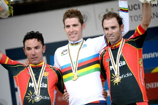 2013 road race world champion Rui Costa (Portugal) on the podium flanked by a pair of Spaniards - Joaquim Rodriguez and Alejandro Valverde