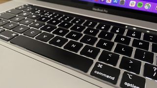 A close up of the keyboard from a MacBook Pro