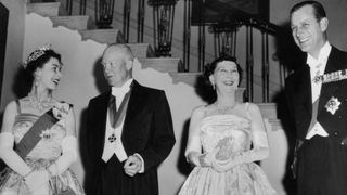 20th October 1957: Left to right: Queen Elizabeth II, US president Dwight D Eisenhower (1890 - 1969) with his wife Mamie (1896 - 1979) and Prince Philip, Duke of Edinburgh at a White House State banquet.