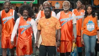 Lil Rel Howery and Kyrie Irving lead their team to the court in Uncle Drew.