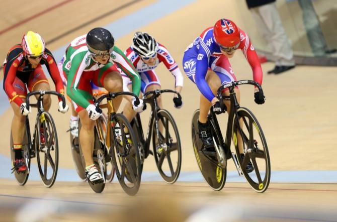 Jess Varnish (Gbr) powers down the home straight to win her Keirin heat.