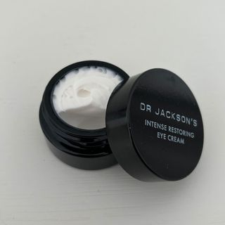 Laura holding Dr Jackson's Intense Restoring Eye Cream