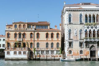 Palazzo styled homes on the waterfront in Italy