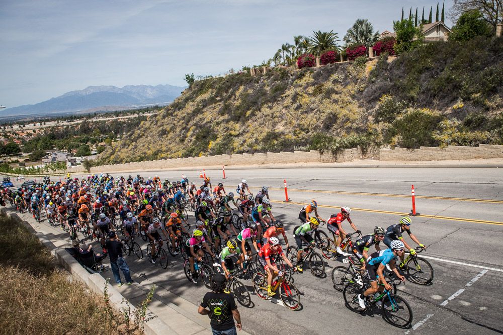The men's peloton hits the climb