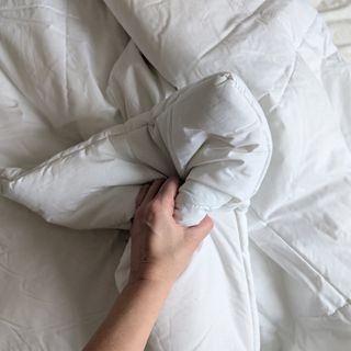 The Dreamland heated duvet being tested on a bed