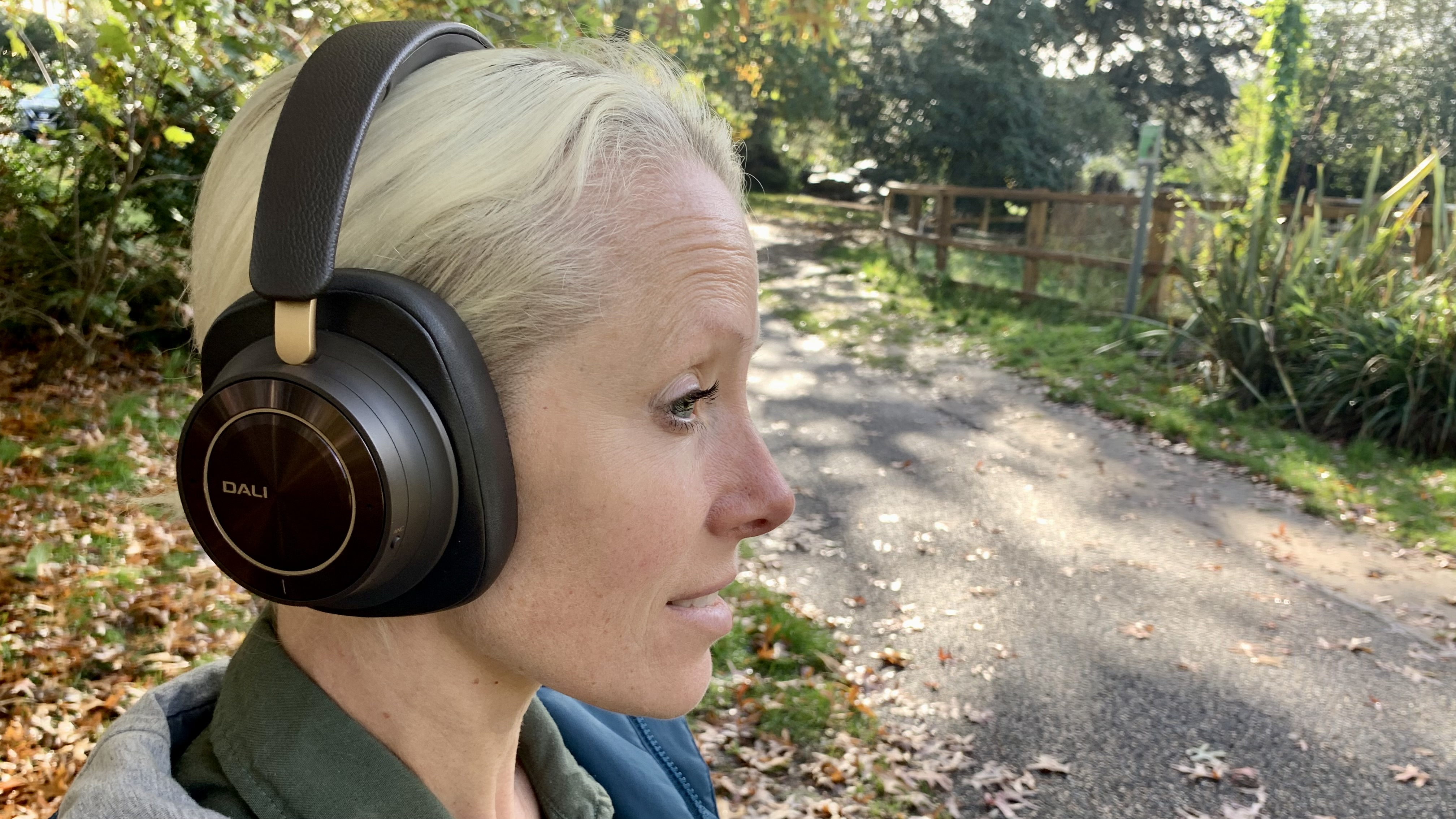 TR's Becky Scarrott wearing Dali iO-12 headphones in a park