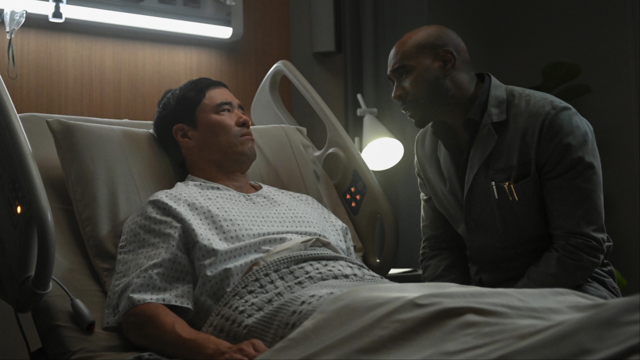 Watson leaning over Moriarty in a hospital bed in Watson Season 1x13