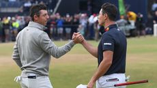 Rory McIlroy and Viktor Hovland shaking hands after the third round of the 2022 Open
