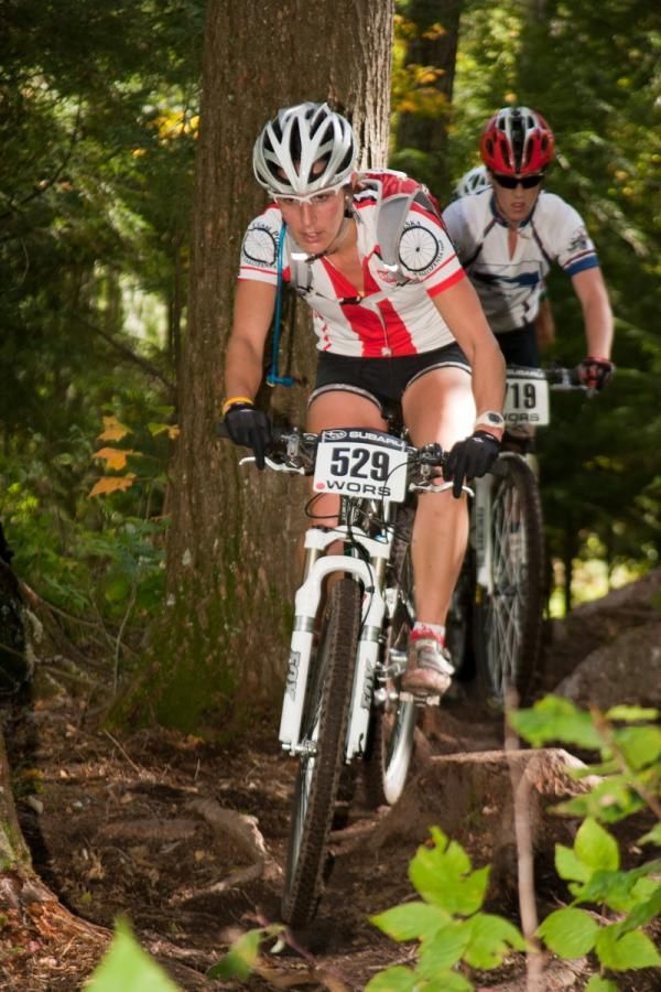 Third place finisher Anna Ganju (Team Polska) leads through the singletrack at WORS Bear Paw.