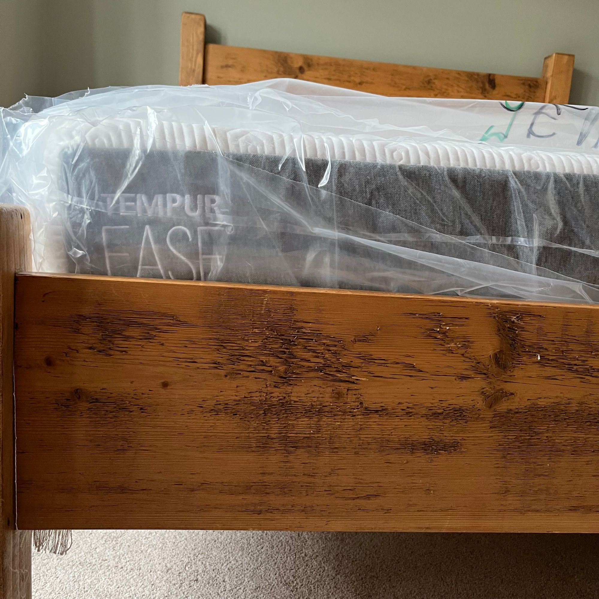 Tempur Ease 20cm in packaging on bed frame
