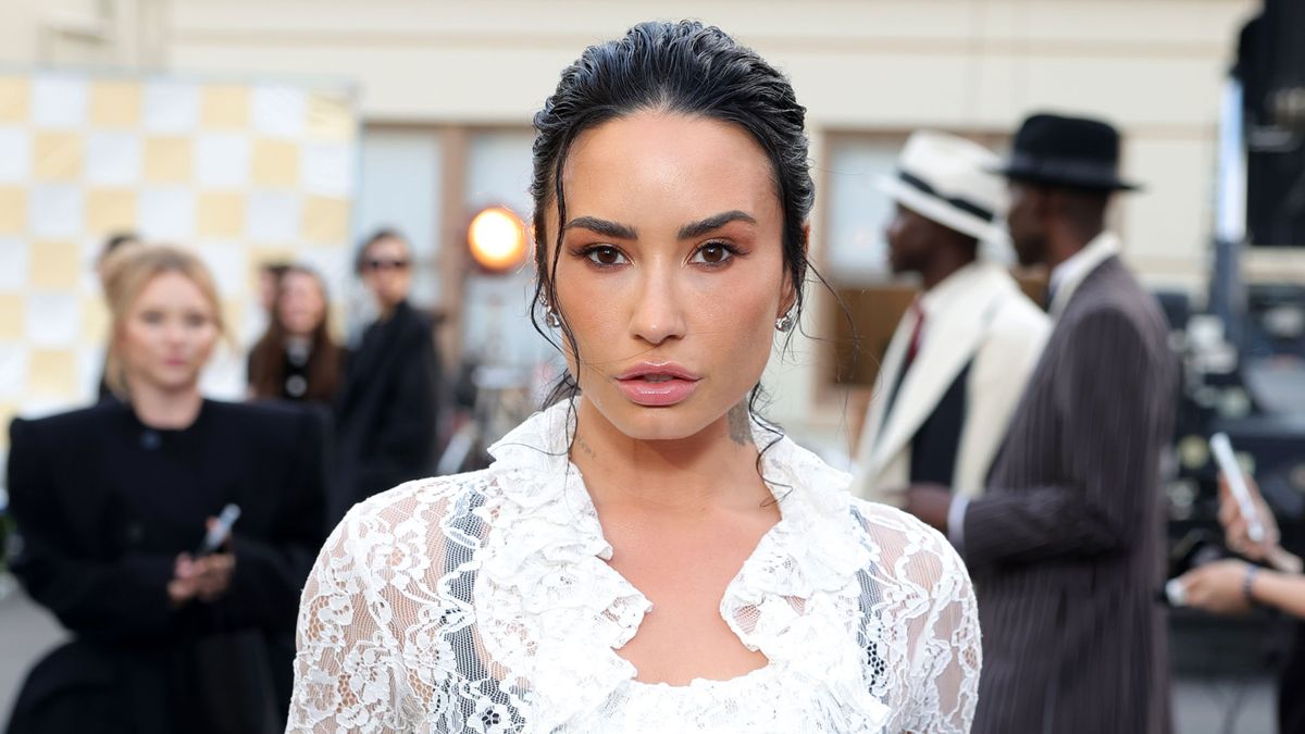 Black Tights Can Look Basic—Except When You Wear Them With Demi Lovato's Specific Skirt Trend